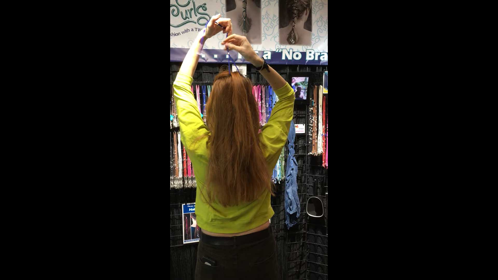 Video still of a model doing a hair wrap tutorial. | Ear Curls, Ear Climbers
