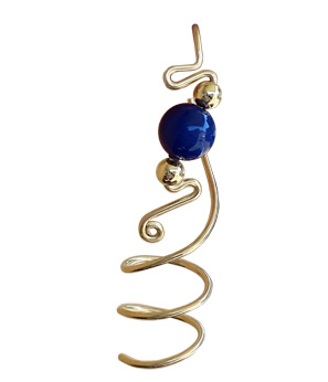 Gold earring with squiggly designs and a single dark blue bead. | Ear Curls, Ear Climbers